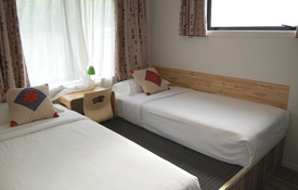 two single beds in the second room